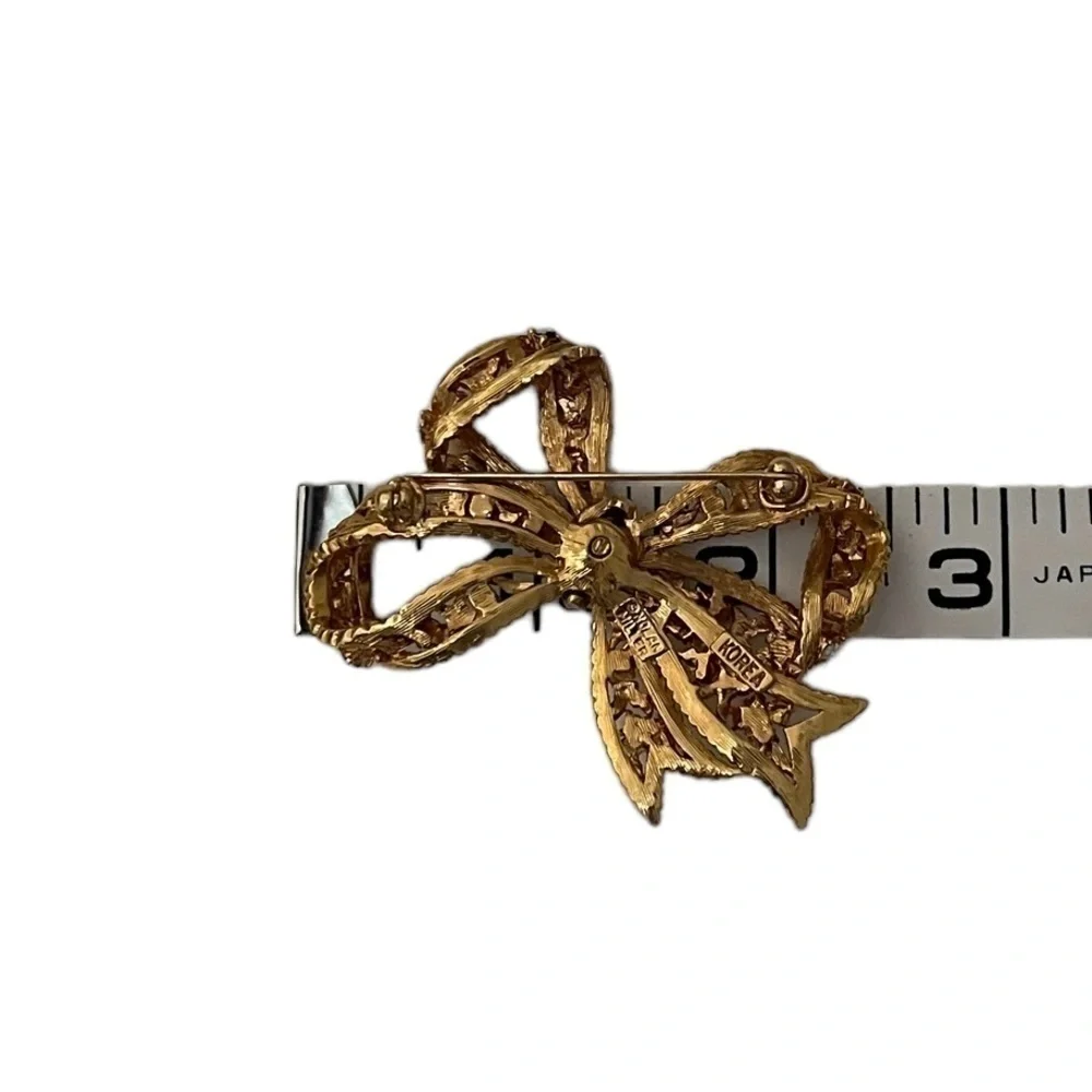 Nolan Miller Unique Gold & Crystal Bow Brooch